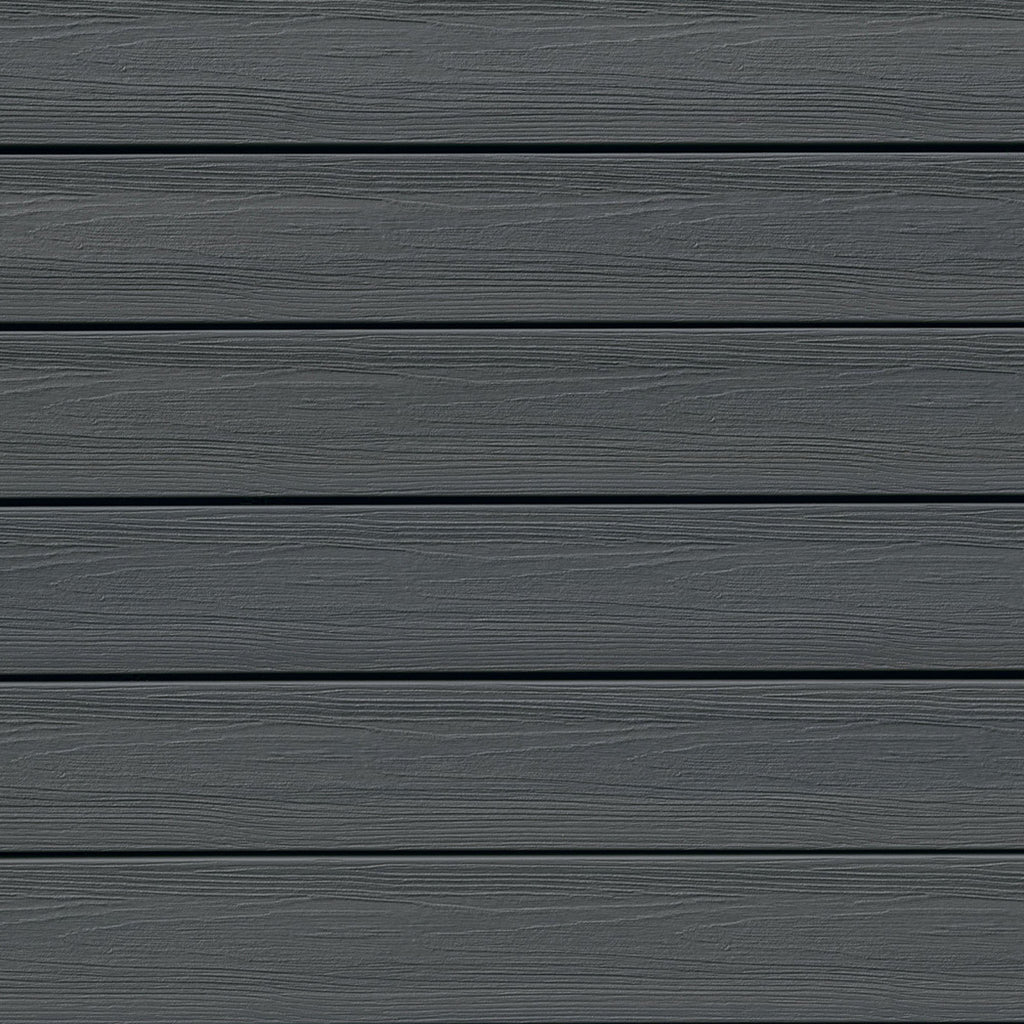 Close-up texture of Eva-Last Infinity Concrete Grey composite decking showing a smooth, light grey finish. Shop at Deck Outlet!