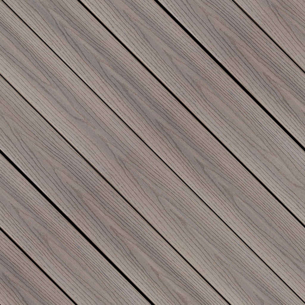 Close-up of Fiberon GoodLife Cabana composite decking board, featuring light sandy wood-grain tones and a protective three-sided cap layer.