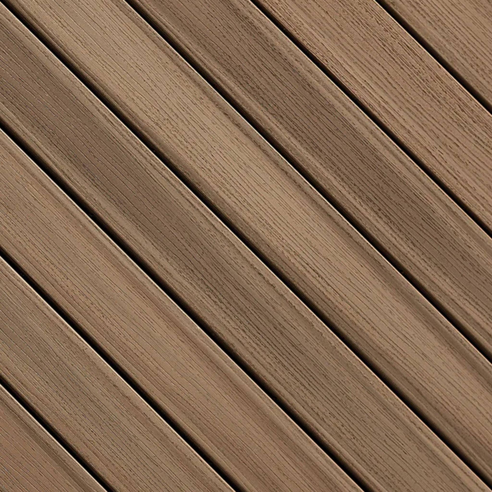 Close-up of Fiberon Paramount Brownstone PVC decking board, featuring a sophisticated brown finish with high slip resistance and moisture-proof technology.