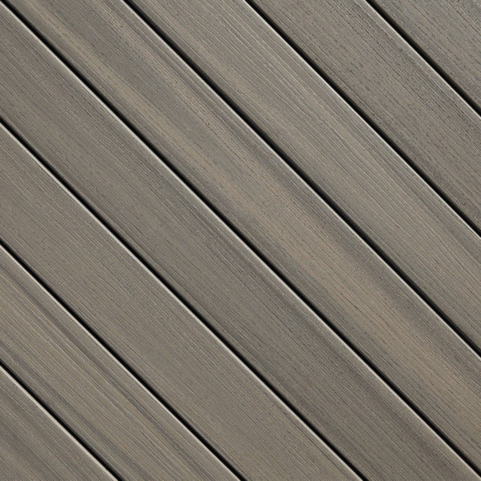 Close-up of Fiberon Paramount Sandstone PVC decking board, showing soft sandy tones and a slip-resistant texture designed for waterfront and pool applications.