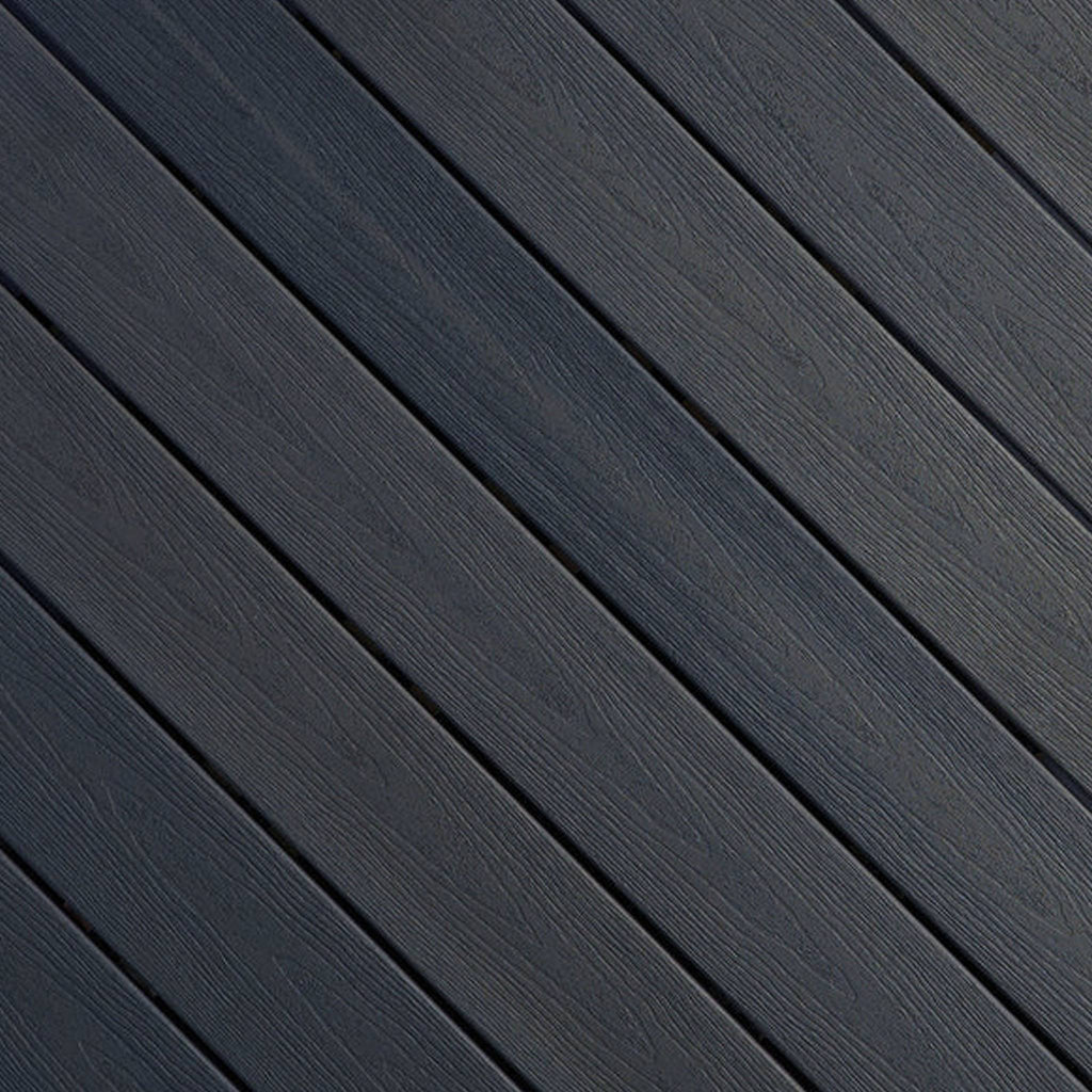 Close-up of Fiberon Sanctuary Earl Grey composite decking, showcasing its cool multi-tonal gray grain and rustic embossed surface texture.