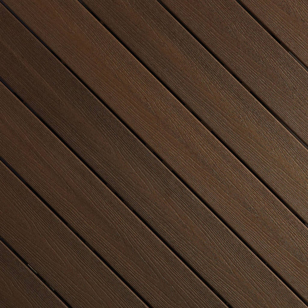 Close-up of Fiberon Sanctuary Espresso composite decking, showcasing its deep coffee-brown multi-tonal grain and rustic embossed surface texture.