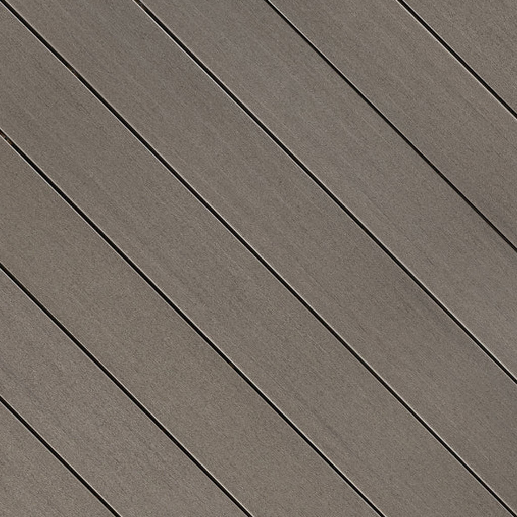 Close-up of Fiberon Promenade Shaded Cay PVC decking board, showing its cool gray wood-grain texture, premium matte finish, and slip-resistant surface.