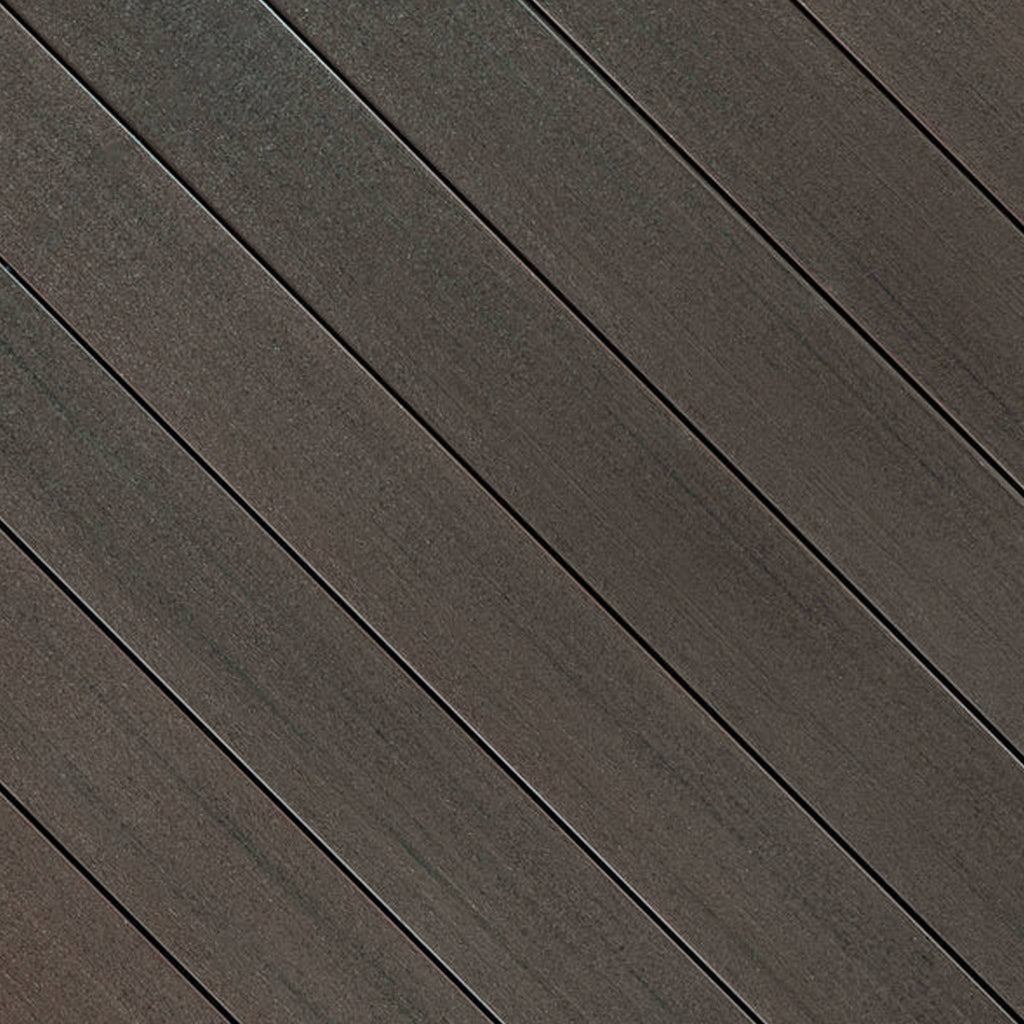 Close-up of Fiberon Promenade Weathered Cliff PVC decking board, showing its muted earthy wood-grain texture, premium matte finish, and slip-resistant surface.