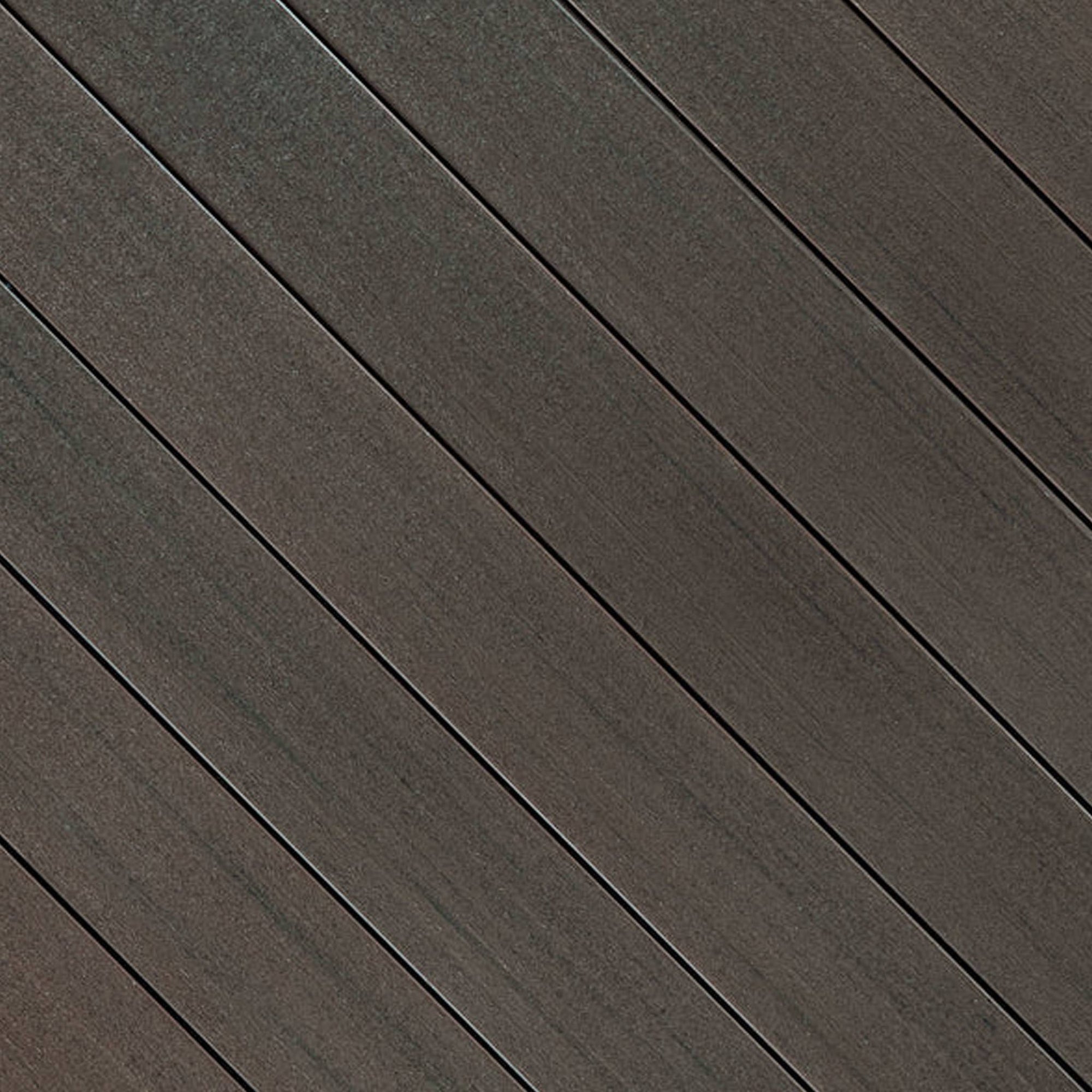 Close-up of Fiberon Promenade Weathered Cliff PVC decking board, showing its muted earthy wood-grain texture, premium matte finish, and slip-resistant surface.