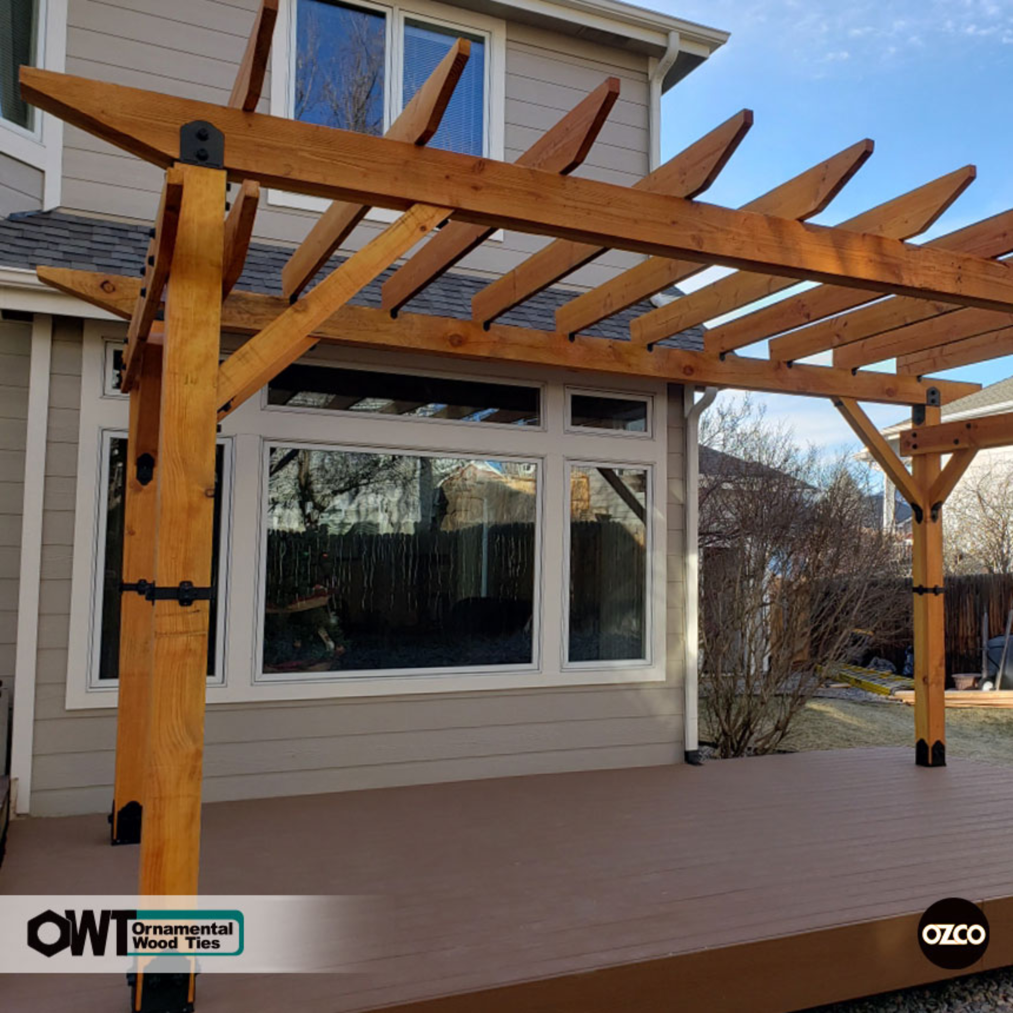 OZCO Laredo Sunset 6x6 post caps installed on outdoor pergola structure