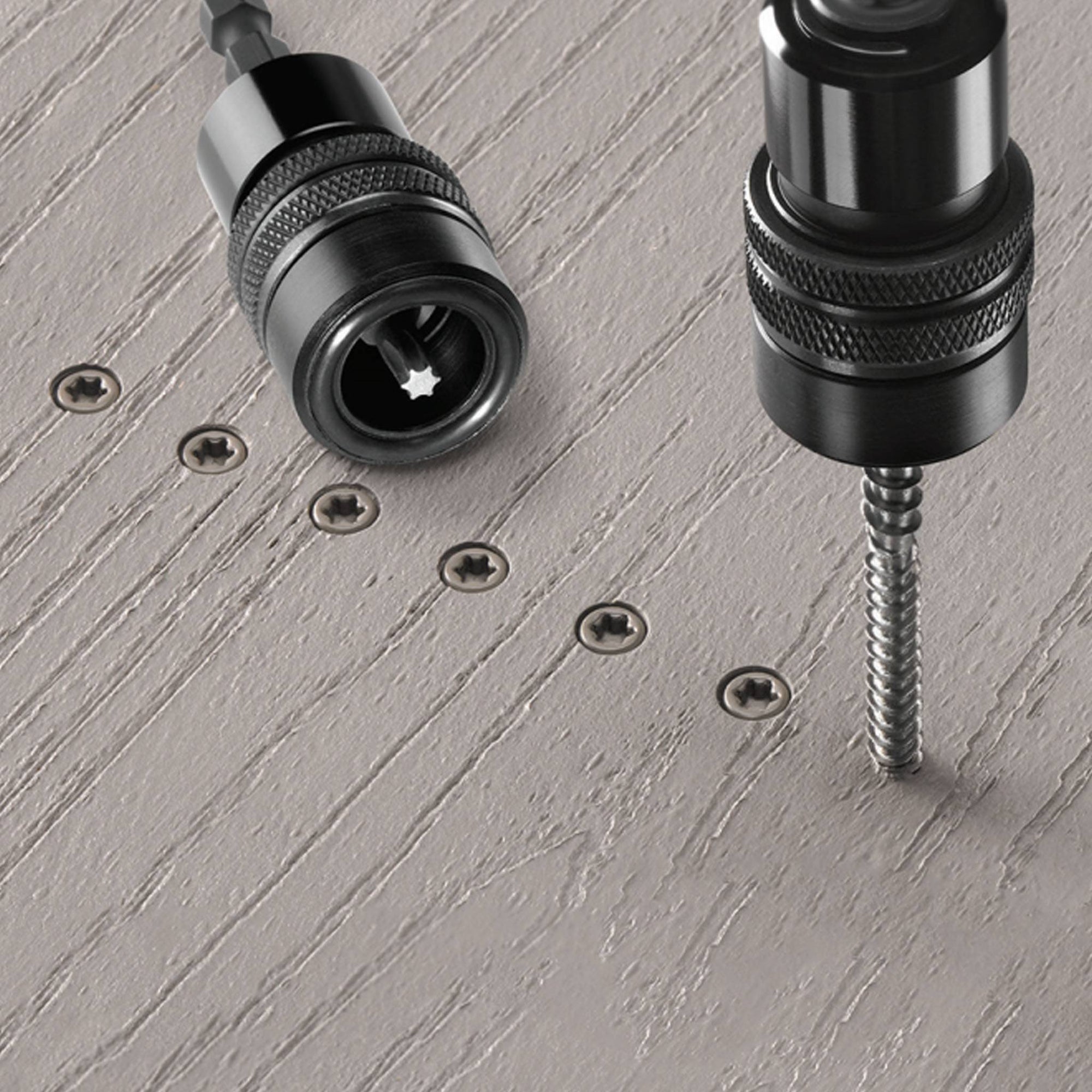 Starborn Smart-Bit Depth Setter shown with Cap-Tor xd Epoxy deck screws, demonstrating perfect depth control for composite decking fasteners.