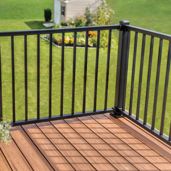 Trex Signature aluminum railing with square balusters installed on a corner deck