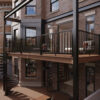 Multi-level deck with black Trex Signature aluminum railing and square baluster design