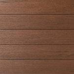 Close-up of AZEK Porch Mahogany boards displaying rich brown wood texture